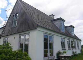 Bondehus med nyt tag