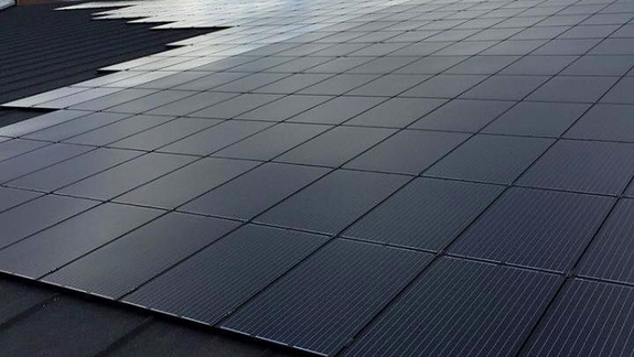 Erhvervsanslæg solceller limet på tagpap #Køgetømrer